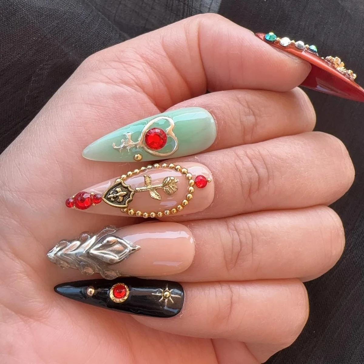 Red and teal statement nails