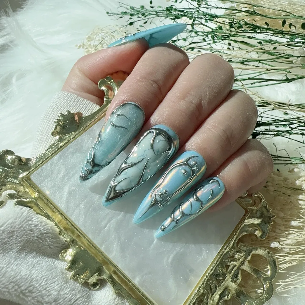 Cool blue embellished nails