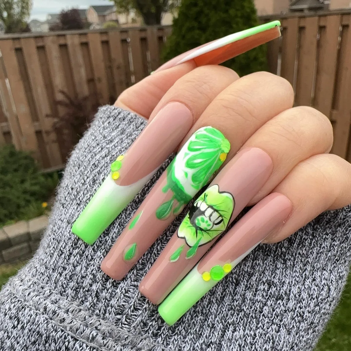 Lime green character nail art